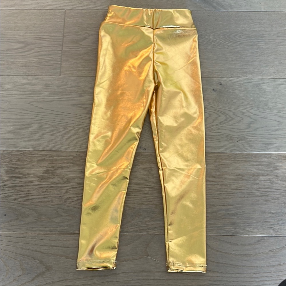 Kids Gold Metallic Leggings. Never worn. 9.5” inseam. Perfect for dance or cheer